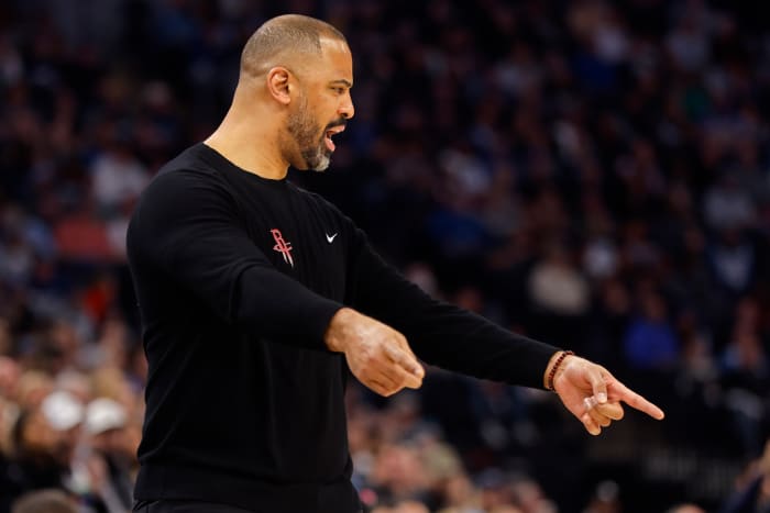 Rockets head coach Ime Udoka questions a referee as his team plays the Minnesota Timberwolves in the first quarter at Target Center.